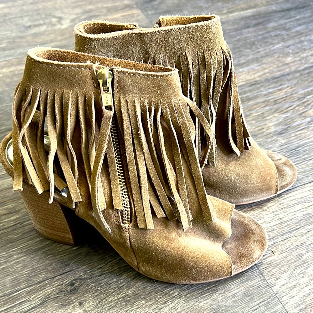 Western style shoes, by Carlos Santana